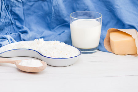 Assortment of dairy milk prodacts cheese, milk, creame, cottage cheese. Nature organic products concept.の写真素材