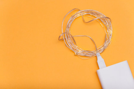 Garland with lights from usb cable. Flat lay.の写真素材
