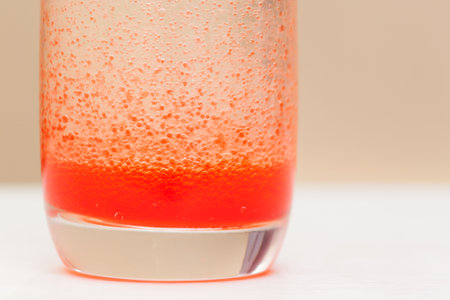 Fun and easy science and experiment for kids. Oil and water don't mix.の写真素材