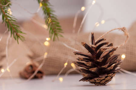 Pine cone in the shape of christmas decoration for tree. Eco friendly and zero waste concept.の写真素材