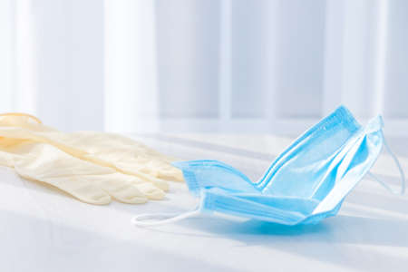 Coronavirus prevention medical surgical masks and gloves. Concept covid-19 protection. No infected cases coronavirus or virusis concept. Reduce morbidity viruses.の写真素材