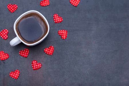 Cup of black coffee for father, hearts on black background. I love you DAD concept. Flat lay, copy space.の写真素材