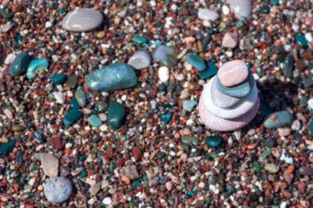 Stacked pebbles along the beach. Harmony, relaxation concept.