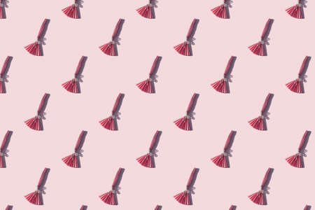 Seamless pattern with pink paper witchcraft. Halloween creative background.