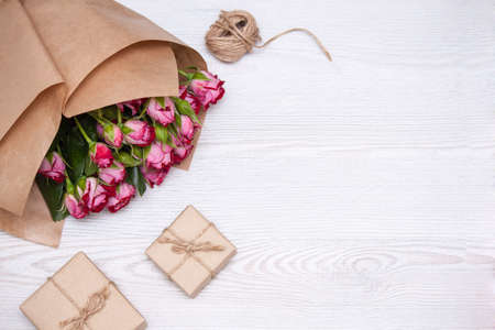 Flowers, present boxes from eco friendly materials. Natural concept for holidays.の写真素材