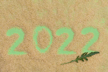 2022 numbers from cous cous. New year background.の写真素材