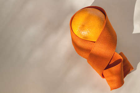Fitness elastic rubber band with fruits. Diet healthy food and lifestyle health concept.