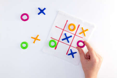 Tic tac toe game from colorful plasticine. DIY concept, simple handmade game.の写真素材
