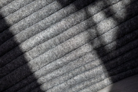 Stack of gray warm fleece blankets.の写真素材