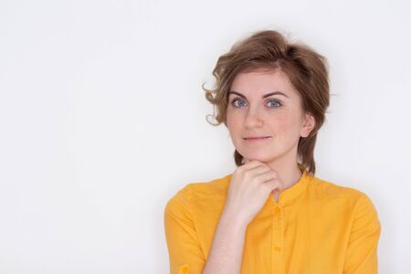Close-up portrait of her she nice attractive lovely wavy-haired girl thinking creating new plan isolated over bright vivid shine white color backgroundの写真素材