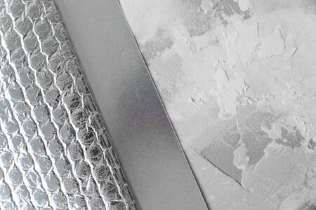 Plaster background texture, cement floor texture, concrete, gray and white edges, abstract pattern, silver background. The concept of the combination of backgroundsの写真素材