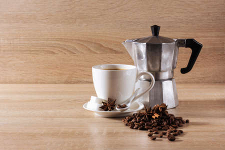 coffee cup, geyser coffee maker, coffee beans, backgroundの写真素材