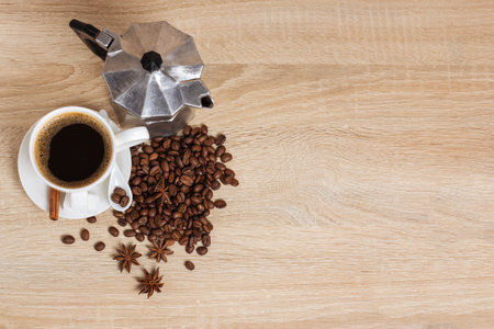 coffee cup, geyser coffee maker, coffee beans, background, view from aboveの写真素材