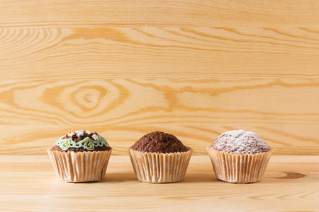 homemade cakes on a wooden backgroundの写真素材