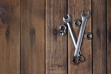Set of two Wrenches on a wooden plank backgroundの写真素材