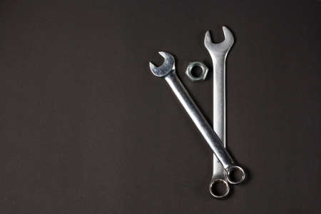 spanners and screw-nut on black backgroundの写真素材