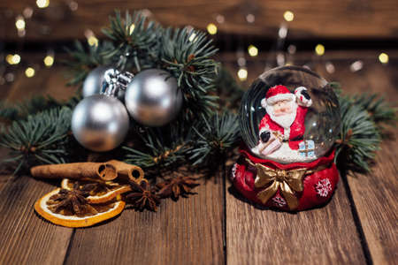 Christmas composition (Christmas tree decorations, Christmas tree branches, Christmas balls, Santa Claus)の写真素材