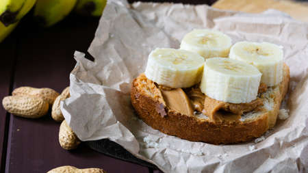 fast food, snack, peanut butter and banana sandwich on the table