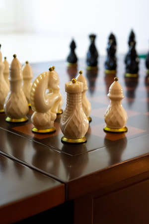 the concept of the game, chess pieces on the table
