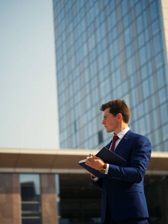 Businessman makes a planの写真素材