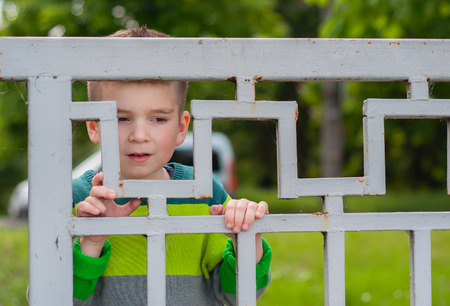 Boy having fun on playground.の写真素材