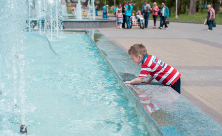 Boy having fun on playground.の写真素材