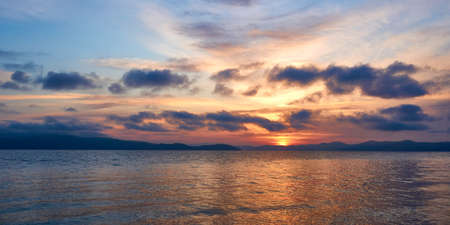 Summer, August, dawn over the Yenisei River in the Abakano-Perevoz area, there are small waves and...