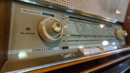 Obsolete radio in wooden case. Horizontal indoors shotの写真素材
