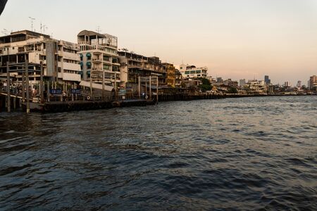 Small pier Extending to the Chao Phraya River in Bangkok.