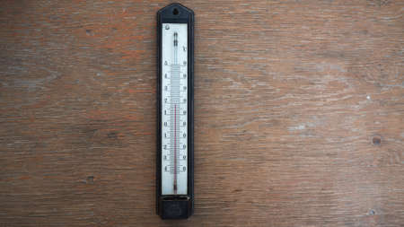 thermometer on woodの写真素材