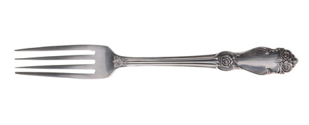 Silver fork close up on a white background