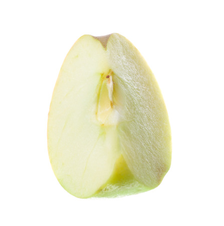 slice of juicy apple isolated on white backgroundの写真素材