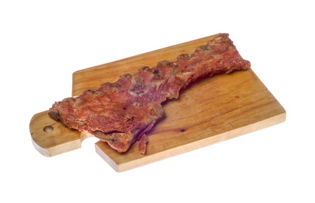 meat delicatessen on the board isolated on the white  .の写真素材