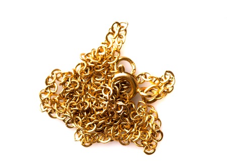 gold chain isolated on white background .の写真素材