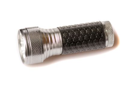 Flashlight isolated on a white background .