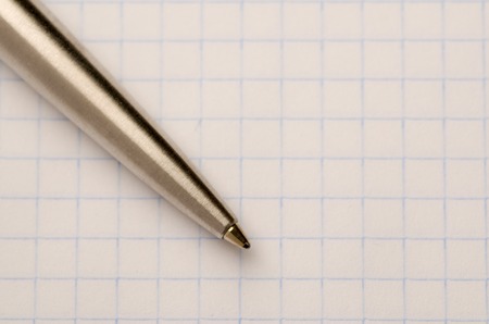 pen located on the notebook sheet .の写真素材