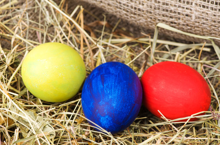 Easter eggs on a wooden table .