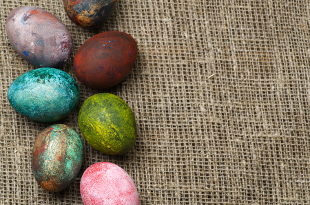 Easter eggs on a wooden table .Rustic style. Top view. Free space for text.の写真素材