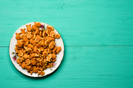 Crackers on a wooden table. Rustic style .Top view. Free space for text.の写真素材