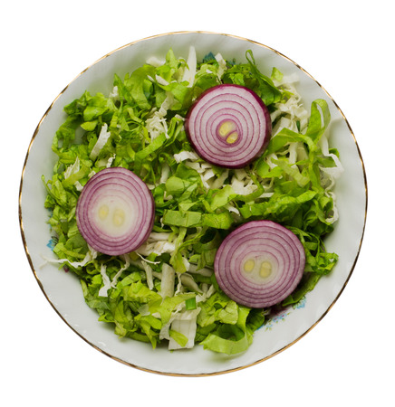 cabbage salad in a plate isolated on white background .  Top viewの写真素材