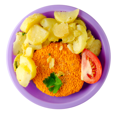 meatball  with potatoes   isolated on white background. meatball with a slice of tomato on a plateの写真素材