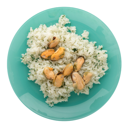 White rice with mussels on a plate. Rice with mussels  isolated on white background. rice top viewの写真素材