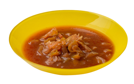 vegetable soup isolated on white background .vegetable soup in yellow  plate  side viewの写真素材