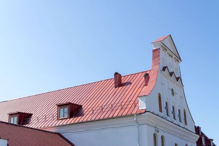top of a building against the blue sky.urban architecture.の写真素材