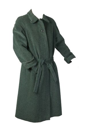 Female woolen dark green coat with a hood isolated on a white background. women's coat cut a trapezeの写真素材