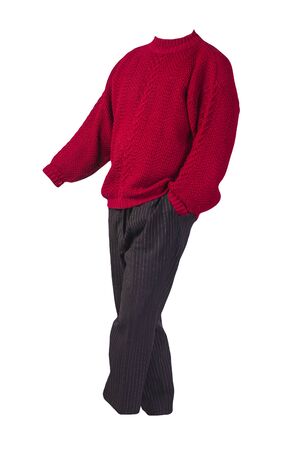 women's black pants striped and knitted red sweater isolated on a white background. comfortable casual wearの写真素材