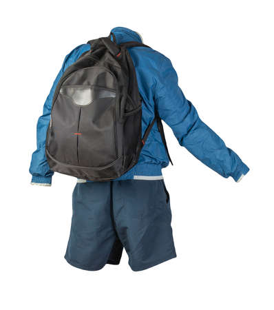 black backpack, dark blue shorts, blue whie windbreaker jacket isolated on white background. casual wearの写真素材