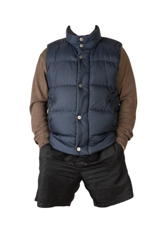 Dark blue sleeveless jacket, brown sweater and black sports shorts isolated on white background. clothes for every dayの写真素材