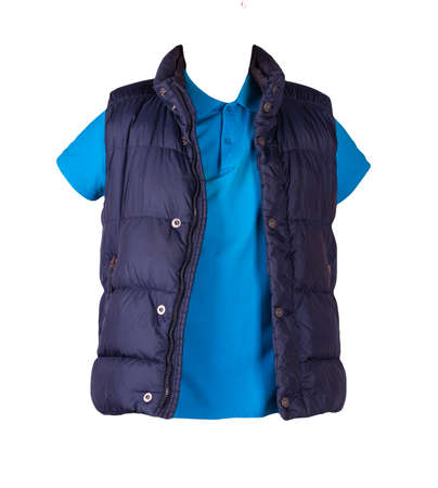 Dark blue sleeveless jacket and blue shirt with collar on buttons and with short sleeves isolated on white backgroundの写真素材
