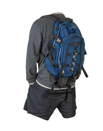 denim blue backpack, dark gray sweatshirt with a hood, black shorts isolated on white background....